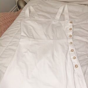 white dress with buttons on side